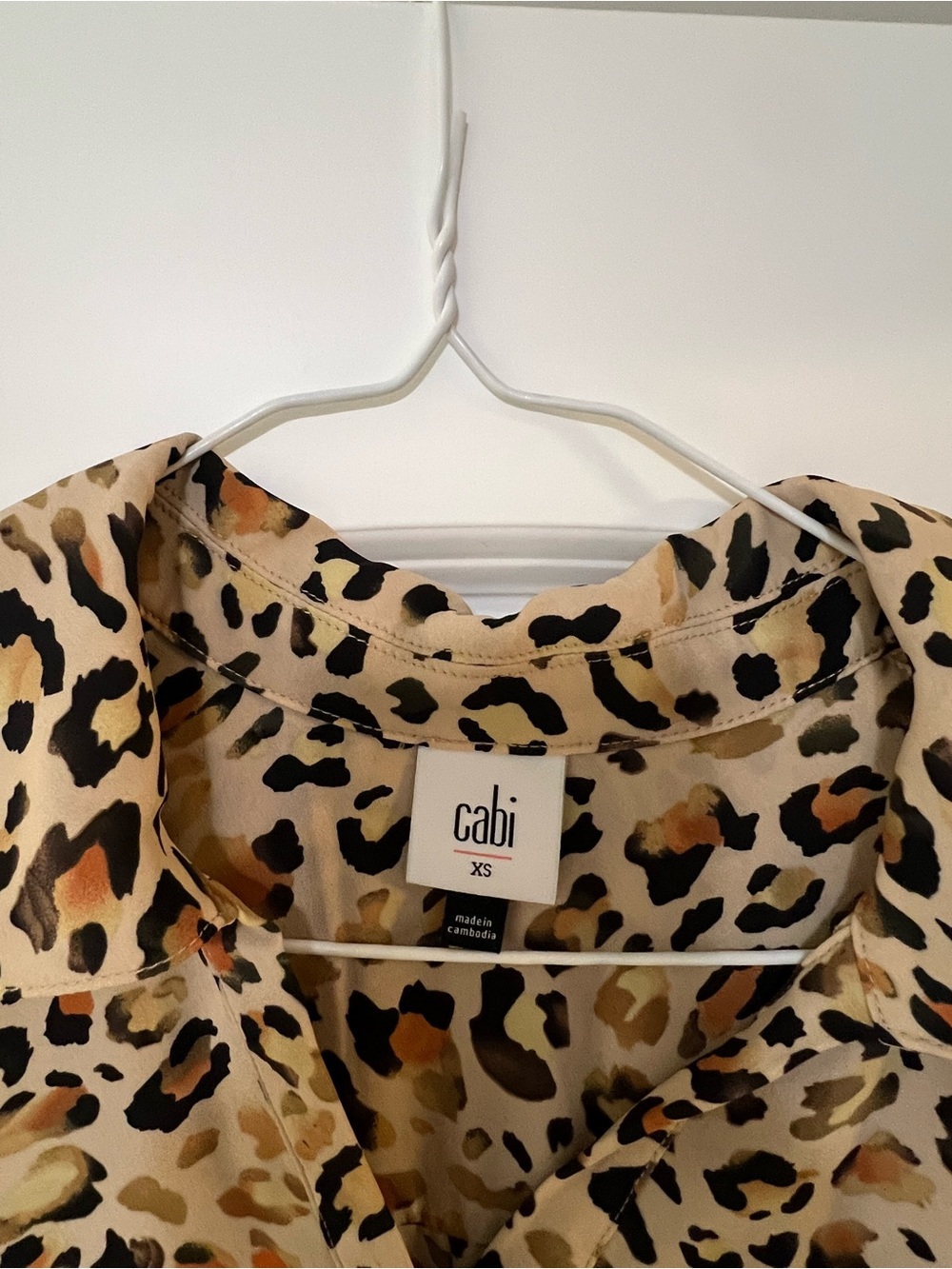 CAbi Leopard Print Short Sleeve Polo in Beige, Black, Brown - Picture 2 of 2
